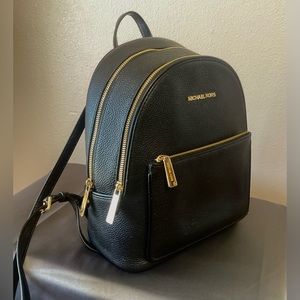Micheal Kors black leather with gold- small backpack style bag